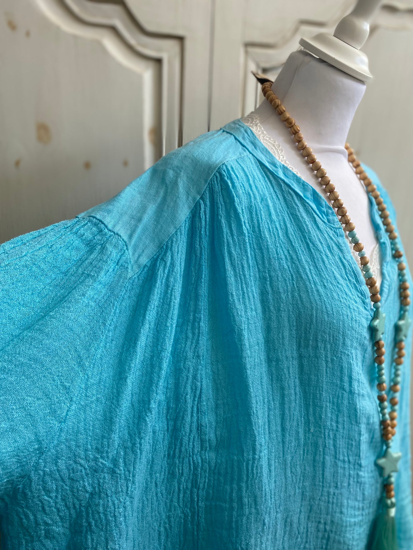 Tunique turquoise convient du 40 au 52