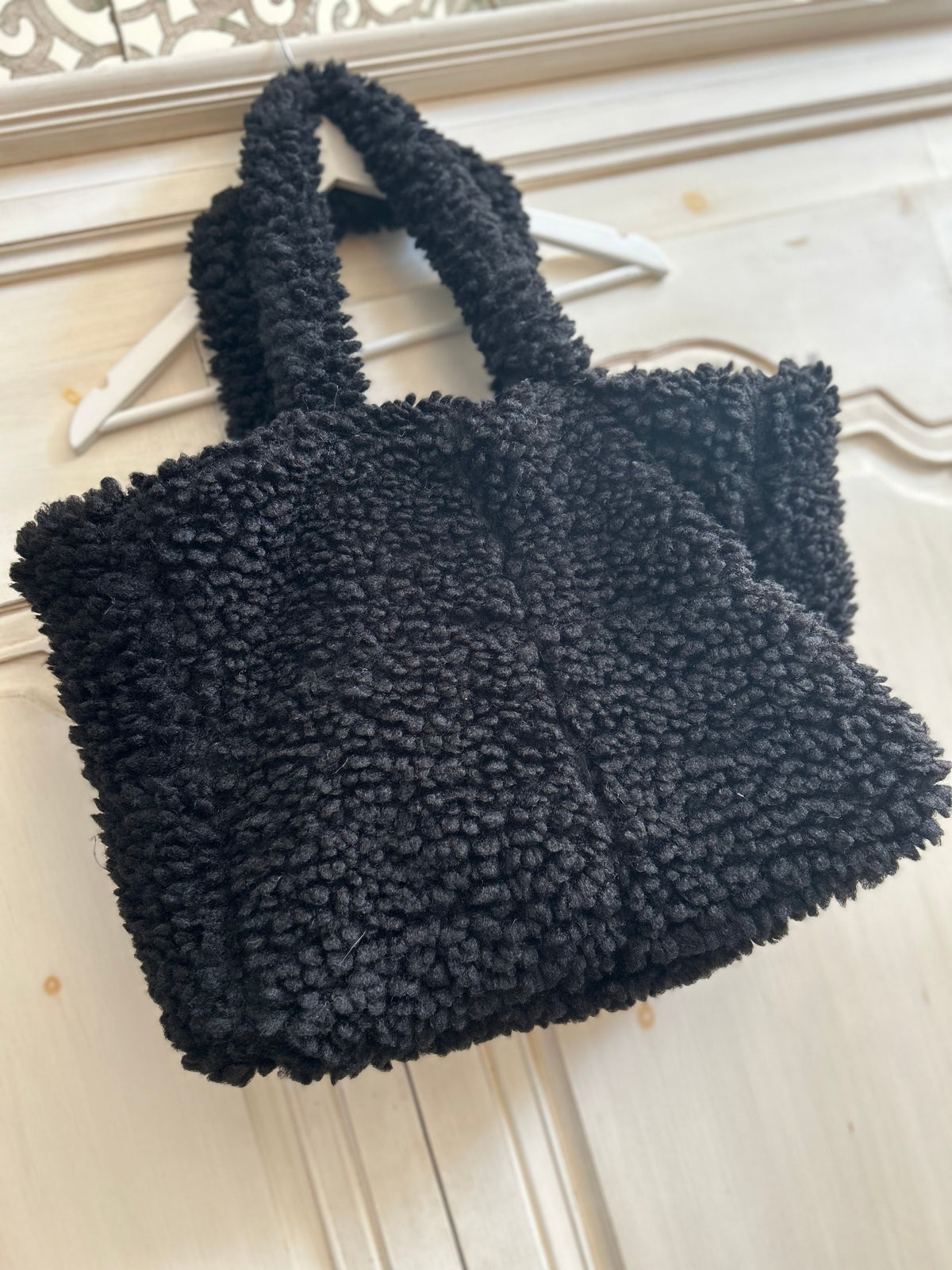 Sac noir moumoute