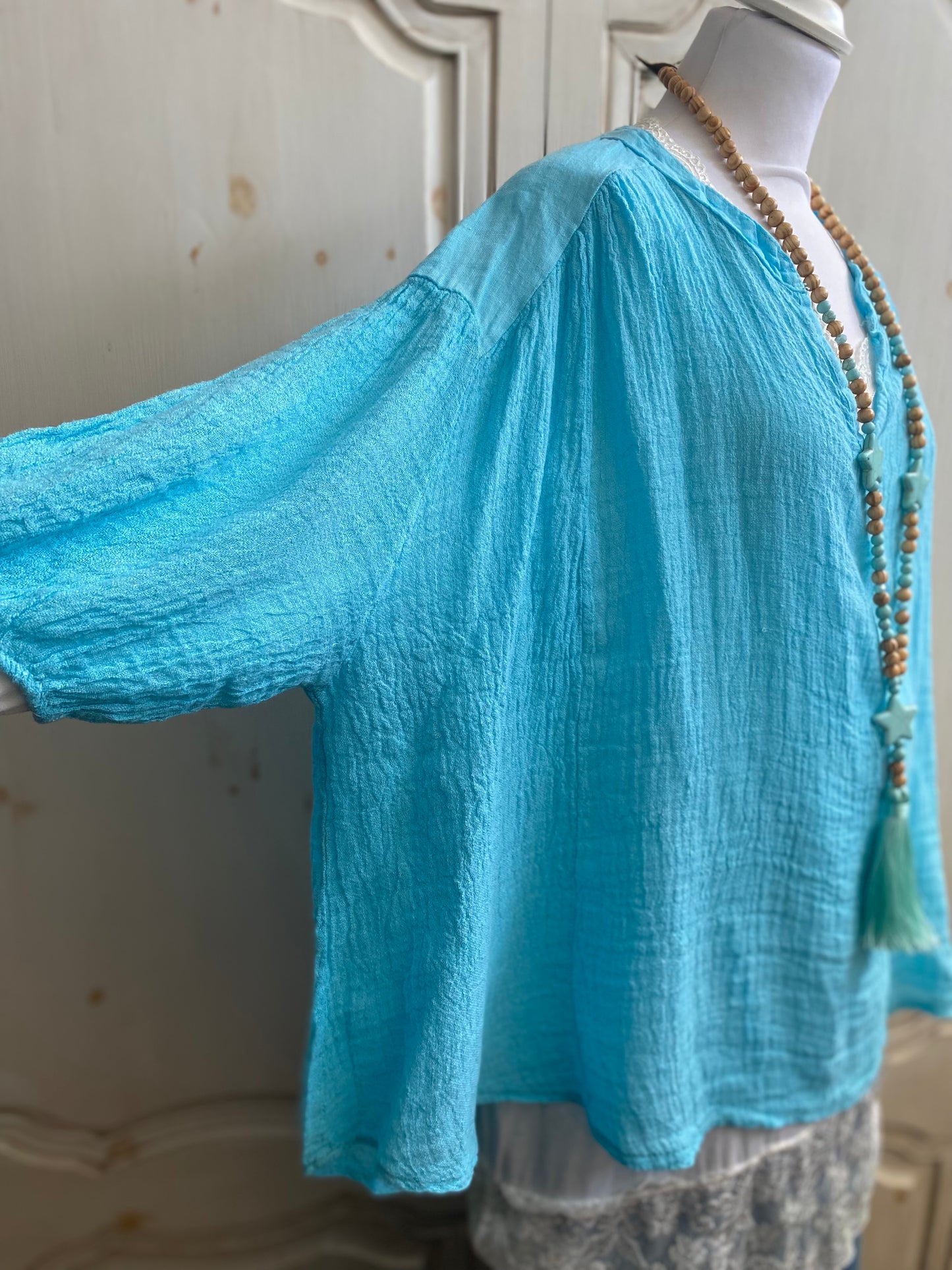 Tunique turquoise convient du 40 au 52
