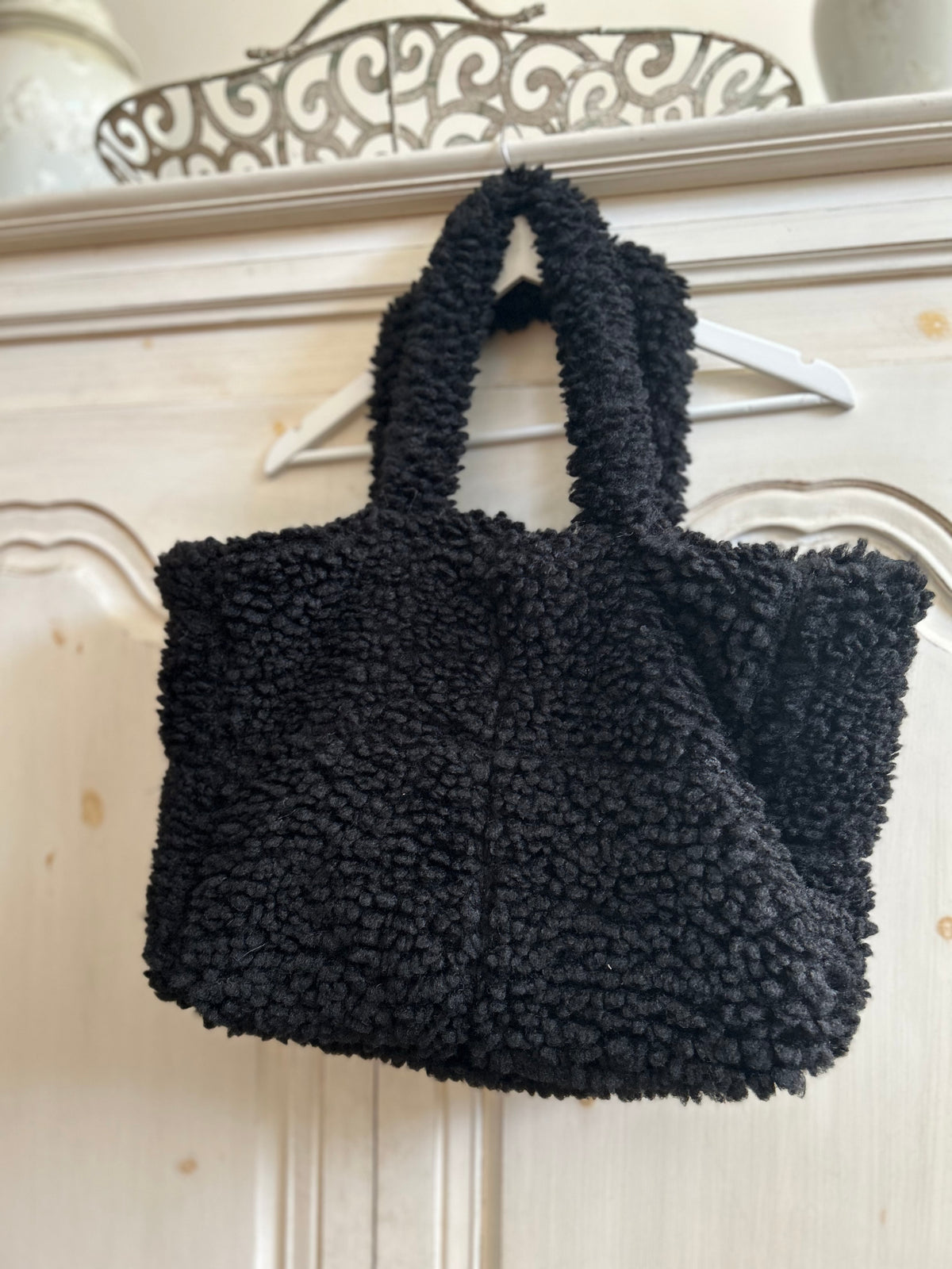 Sac noir moumoute