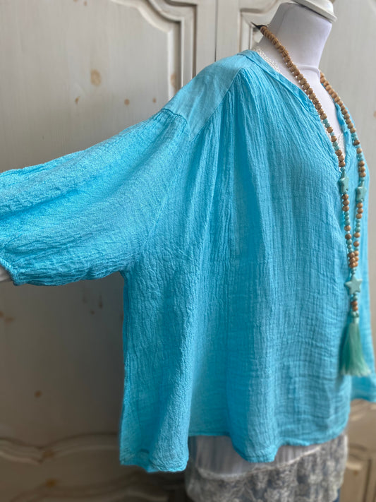 Tunique turquoise convient du 40 au 52